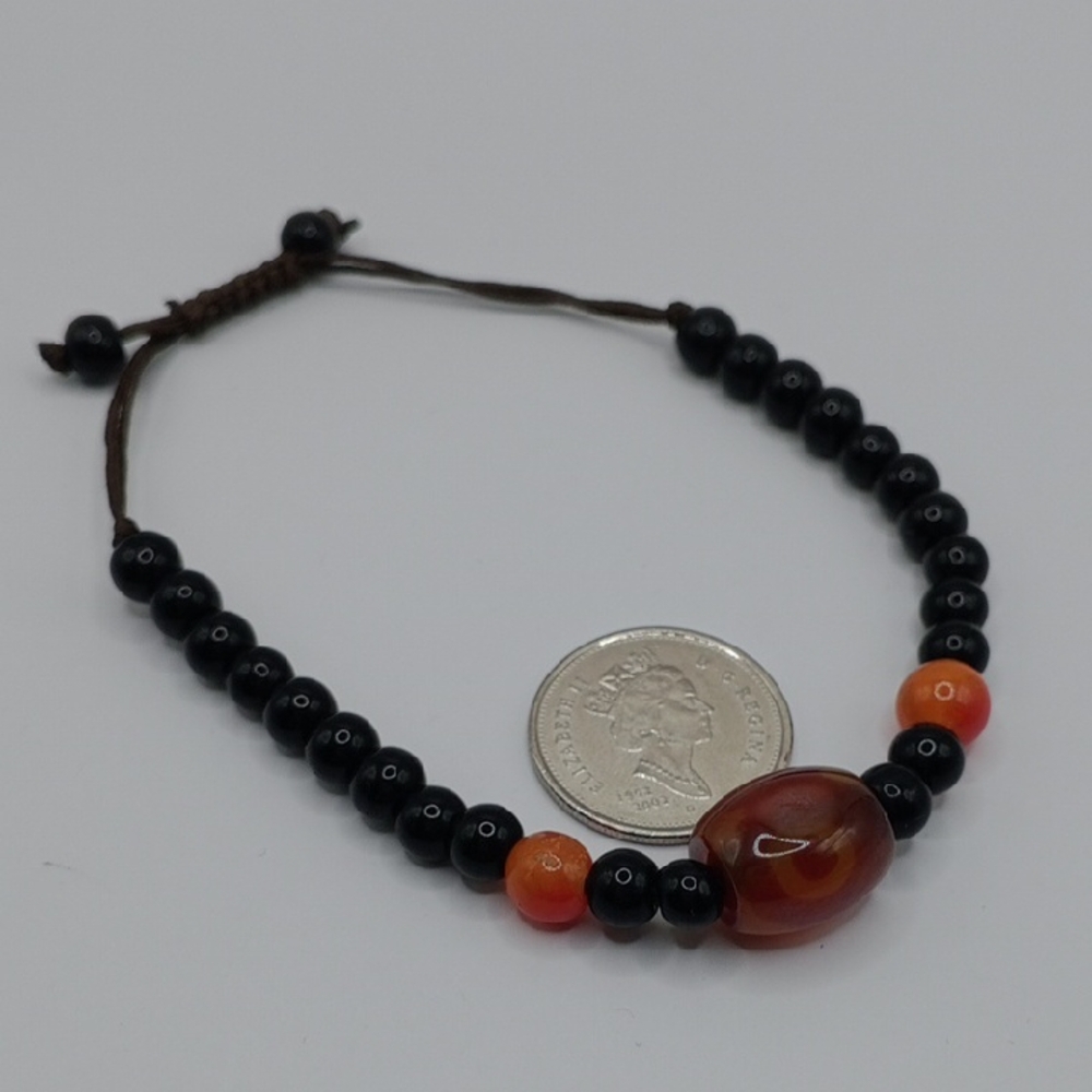 Elegant Black and Orange Beaded Bracelet